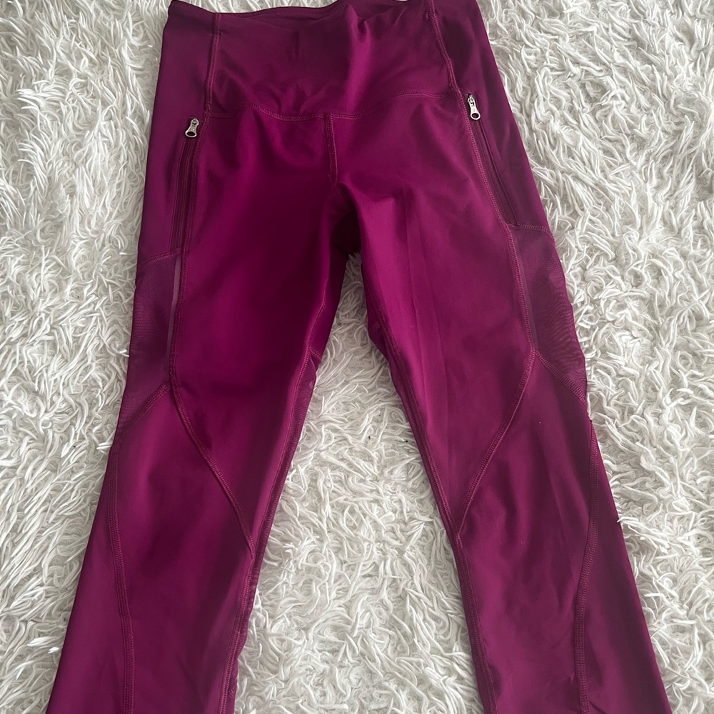 purple/plum capri lululemon with mesh and zippers